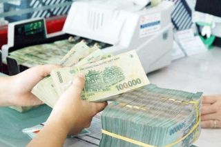 Điểm tên một số ngân hàng nợ xấu tăng vọt, trong khi lợi nhuận giảm sâu