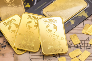 Giá vàng thế giới giảm hơn 2% khi căng thẳng hạ nhiệt, USD phục hồi