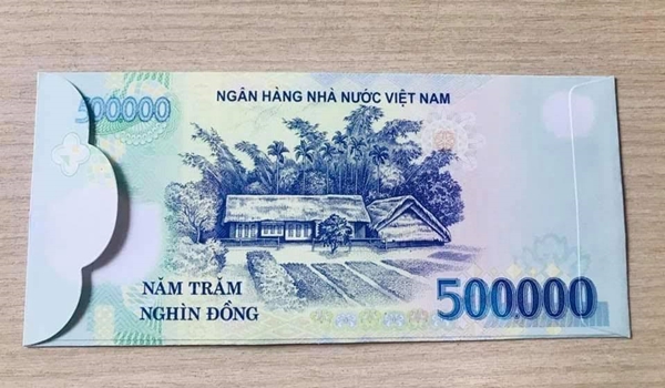 Thị trường Tết sôi động hơn với sự xuất hiện của bao lì xì in hình các tờ tiền Việt - Hình 2