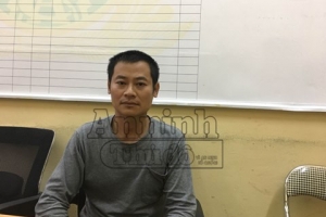 Tạm giữ hình sự đối tượng trông xe dùng hung khí đe dọa khách ở Linh Đàm