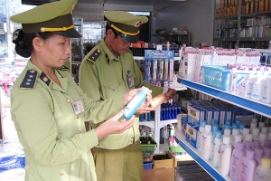 Quy định chi tiết về phương tiện và trang phục làm việc của lực lượng QLTT