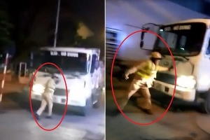 Bị dừng kiểm tra, tài xế xe tải húc thẳng vào cảnh sát giao thông