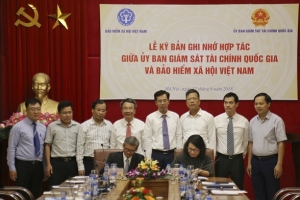 BHXH Việt Nam và Ủy ban Giám sát tài chính Quốc gia ký bản ghi nhớ hợp tác