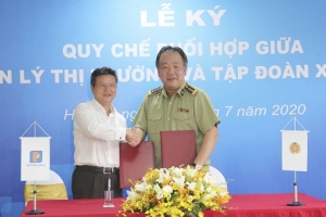 Tổng cục QLTT ký quy chế với Petrolimex nhằm chống gian lận trong kinh doanh xăng dầu