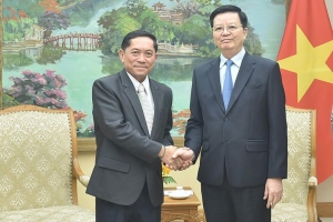 Phó Thủ tướng Mai Văn Chính tiếp Tổng Giám đốc Thông tấn xã Pathet Lào