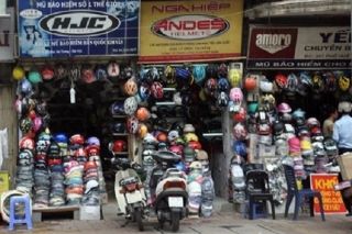 Bãi bỏ nghị định về điều kiện kinh doanh mũ bảo hiểm