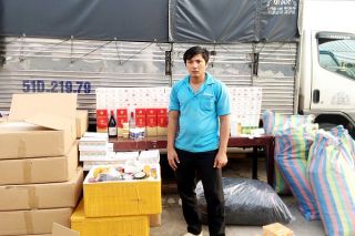 An Giang: Bắt giữ xe ô tô tải vận chuyển 13.800 bao thuốc lá cùng rượu ngoại, dầu... nhập lậu
