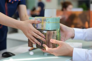 Ngân hàng trước áp lực cân đối nguồn vốn khi tín dụng tăng nhanh