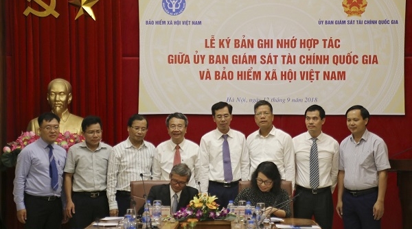 BHXH Việt Nam và Ủy ban Giám sát tài chính Quốc gia ký bản ghi nhớ hợp tác