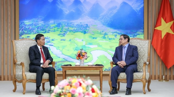 Thủ tướng Phạm Minh Chính tiếp Chủ tịch Ủy ban Trung ương Mặt trận Lào xây dựng đất nước