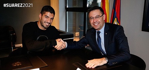 Luis Suarez ký hợp đồng mới với Barcelona - Hình 1