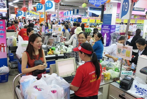 Thị trường hàng hóa Sài Gòn nhộn nhịp ngày giáp Tết - Hình 1