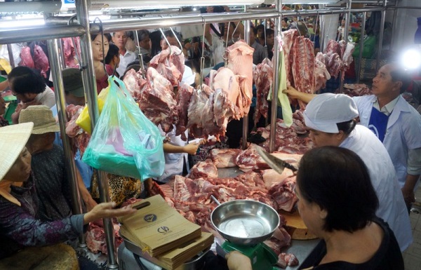 Bộ Công an vào cuộc hỗ trợ giải cứu thịt lợn - Hình 1