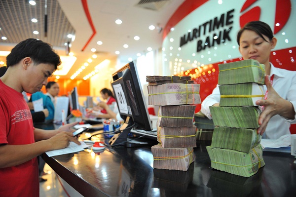 Nới tăng trưởng tín dụng lên mức 20%: Tìm giải pháp hấp thụ nguồn vốn