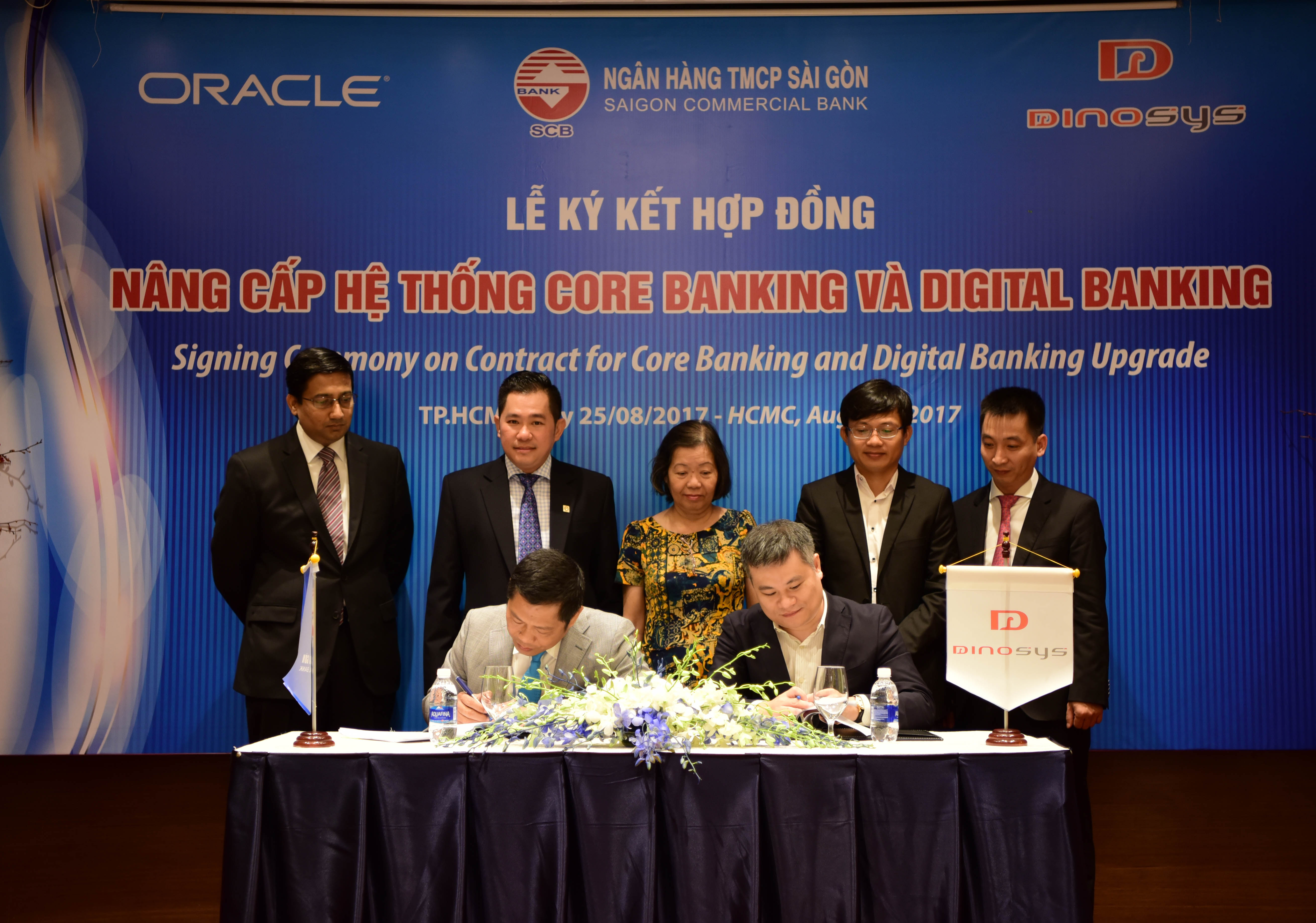 SCB và Công ty Dinosys ký kết: “Hợp đồng nâng cấp hệ thống Core Banking và Digital Banking của Oracl - Hình 1