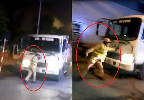 Bị dừng kiểm tra, tài xế xe tải húc thẳng vào cảnh sát giao thông