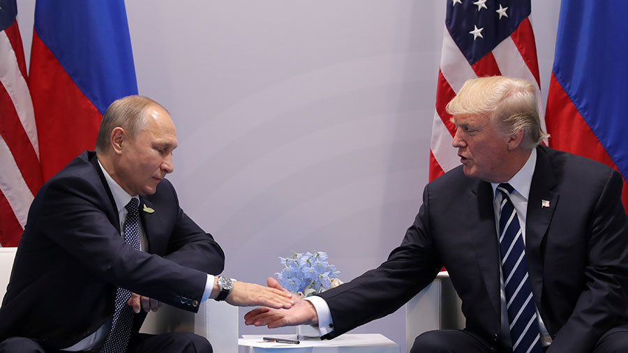 Sau khi trục xuất 60 nhà ngoại giao Nga, Trump bất ngờ muốn gặp Putin - Hình 1