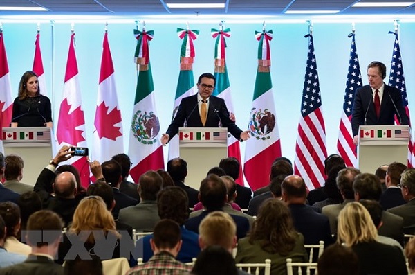 Các nước Bắc Mỹ chưa thể công bố thỏa thuận NAFTA sơ bộ - Hình 1
