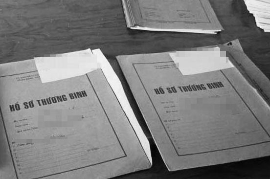 Nghệ An: Phát hiện nhiều hồ sơ thương binh giả - Hình 1