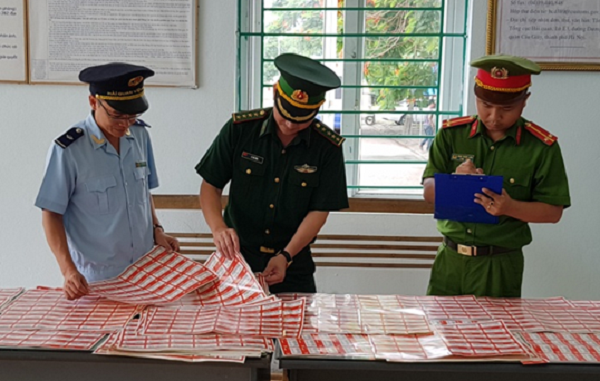 Quảng Ninh: Bắt giữ gần 2.000 tem phụ tùng giả mạo nhãn hiệu - Hình 1