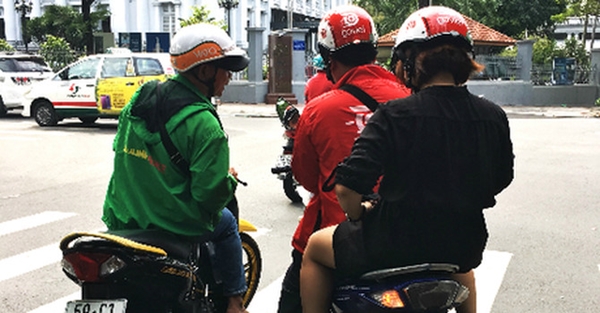 TP. Hồ Chí Minh: Thị trường ‘xe ôm công nghệ’ tranh dành khốc liệt - Hình 1