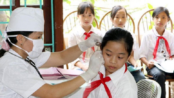 100% học sinh, sinh viên tham gia bảo hiểm y tế: Một bài toán khó