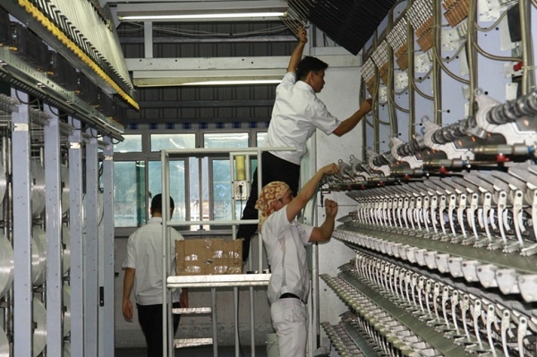 Nhà máy Xơ sợi Đình Vũ nâng gấp đôi công suất sản xuất sợi DTY - Hình 1