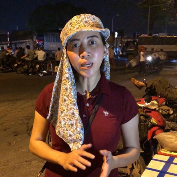 Hai phóng viên điều tra vụ 'bảo kê' chợ Long Biên bị dọa giết - Hình 1