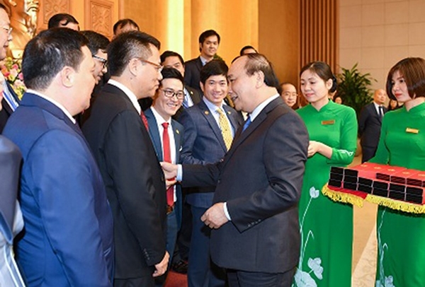 Thủ tướng Nguyễn Xuân Phúc gặp mặt DN có sản phẩm đạt ‘Thương hiệu quốc gia’ năm 2018 - Hình 1