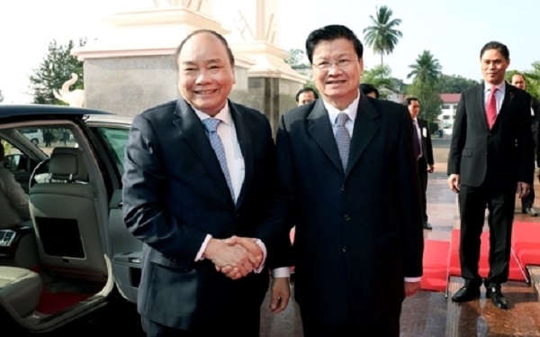 Thủ tướng Lào đến Việt Nam đồng chủ trì Kỳ họp thứ 41 Ủy ban liên Chính phủ Việt Nam - Lào - Hình 1
