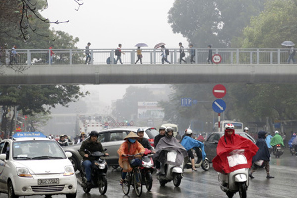 Dự báo thời tiết ngày 11/1: Hà Nội có sương mù, mưa rải rác - Hình 1