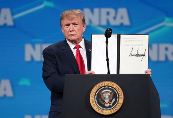 Ông Trump: Mỹ sẽ rút khỏi Hiệp ước Buôn bán Vũ khí quốc tế - Hình 1