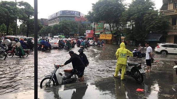 Dự báo thời tiết 3/8: Bão số 3 suy yếu, Hà Nội vẫn mưa to, nguy cơ ngập nhiều nơi - Hình 1