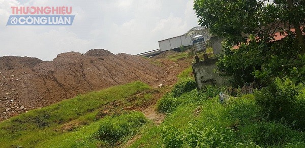 Công ty cổ phần công nghiệp Á Mỹ (công ty Á Mỹ) san lấp mặt bằng, xây dựng các hạng mục công trình phục vụ sản xuất đã lấp cống tiêu thoát nước, lấp hồ Rừng Anh - điều hòa nước