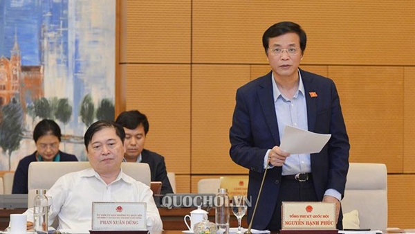 Tổng Thư ký, Chủ nhiệm Văn phòng Quốc hội Nguyễn Hạnh Phúc báo cáo tổng kết Kỳ họp thứ 8 (Ảnh QH)