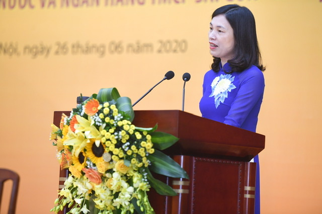 Bà Trần Thị Huệ - Phó Tổng Giám đốc KBNN cho biết việc KBNN và SHB hợp tác nhằm tạo điều kiện để khách hàng có nhiều lựa chọn và thuận lợi hơn để thực hiện nghĩa vụ với NSNN.