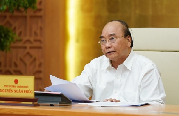 Thủ tướng Nguyễn Xuân Phúc lưu ý mỗi chuyến bay đều phải có phương án phòng, chống dịch cụ thể, kể cả việc giải phóng nhanh hành khách tại sân bay, địa điểm cách ly (Ảnh: VGP)