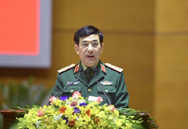 Thượng tướng Phan Văn Giang trình bày báo cáo tóm tắt tại hội nghị. (Ảnh Viết Chung)