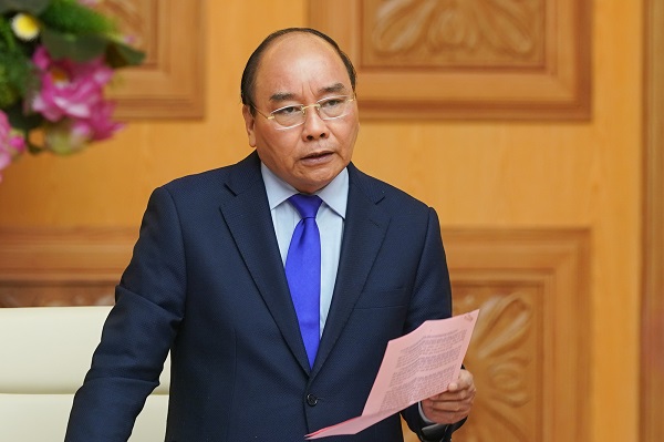 Thủ tướng Nguyễn Xuân Phúc: Chính phủ khuyến nghị mọi người dân đeo khẩu trang khi đến chỗ đông người (Ảnh: VGP/Quang Hiếu)
