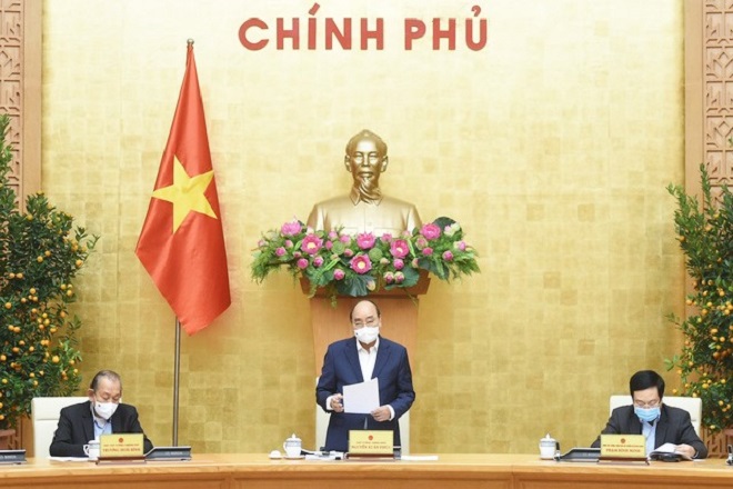 Thủ tướng Nguyễn Xuân Phúc nhấn mạnh tạo mọi điều kiện cho kinh tế tư nhân yên tâm đầu tư sản xuất, kinh doanh tại cuộc họp Thường trực Chính phủ ngày 18/2 - Ảnh: VGP