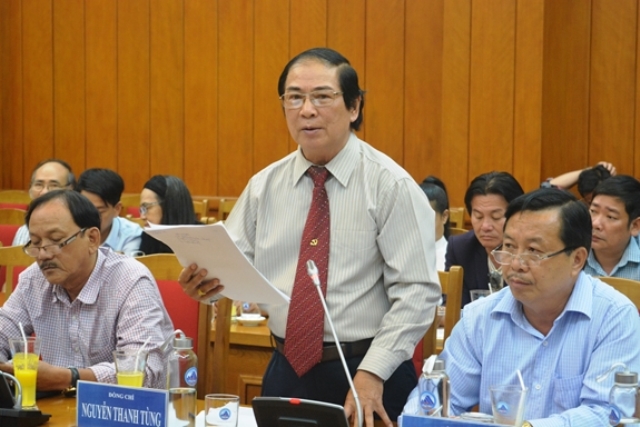 Đại biểu phát biểu ý kiến tham luận tại tọa đàm.