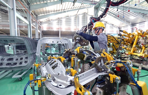 Dây chuyền sản xuất của Công ty TNHH Sản xuất linh kiện thân vỏ ô tô Thaco, Khu kinh tế mở Chu Lai, Quảng Nam (Ảnh: Danh Lam/TTXVN)