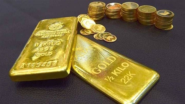 Vàng trên thị trường thế giới tăng sau thông tin xấu từ Mỹ