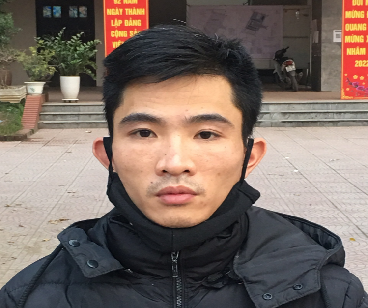 Đối tượng Nguyễn Trung Huyên tại thời điểm bị triệu tập đến cơ quan điều tra (Nguồn ảnh TTXVN)