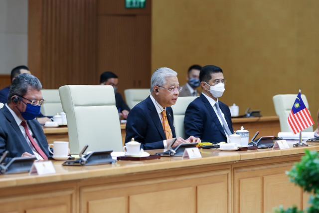 Thủ tướng Ismail Sabri Yaakob bày tỏ ấn tượng sâu sắc về những thành tích phát triển của Việt Nam thời gian qua (Ảnh: VGP/Nhật Bắc)