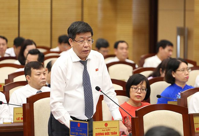 Phó Chủ tịch UBND TP. Hà Nội Dương Đức Tuấn trả lời về dự án 148 Giảng Võ. Ảnh: VGP/BP
