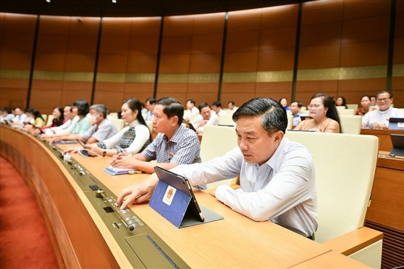 Các đại biểu Quốc hội biểu quyết thông qua Luật sửa đổi, bổ sung một số điều của Luật Sở hữu trí tuệ vào ngày 16/6/2022