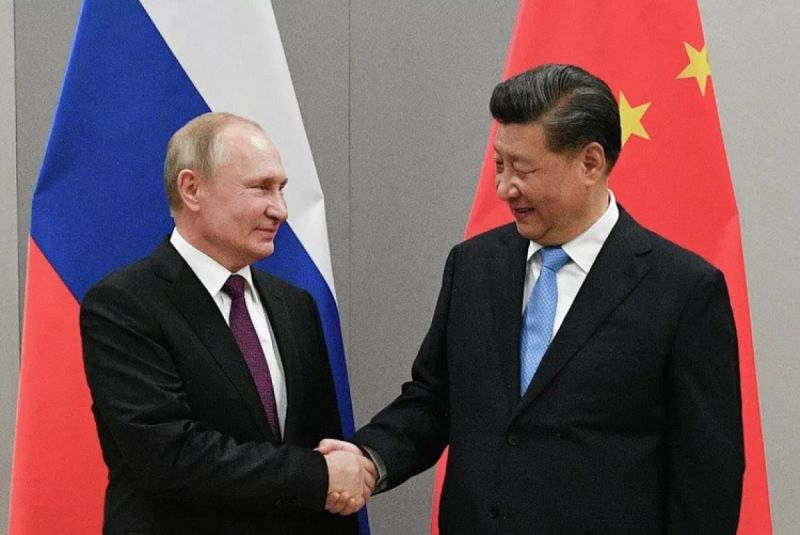 Tổng thống Nga Vladimir Putin và Chủ tịch Trung Quốc Tập Cận Bình trong cuộc gặp. Ảnh: RIA Novosti