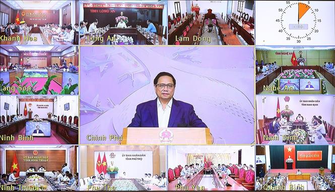 Thủ tướng Phạm Minh Chính chủ trì phiên họp trực tuyến tại điểm cầu Chính phủ. Ảnh: Dương Giang/TTXVN