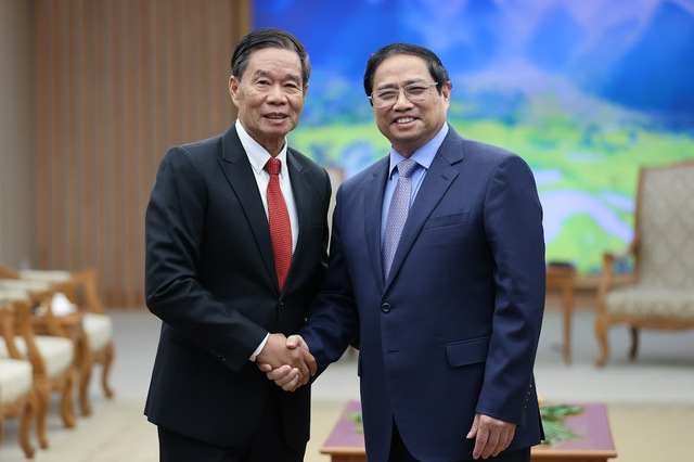 Thủ tướng Phạm Minh Chính chúc mừng những thành tựu mà Đảng, Nhà nước và nhân dân Lào đã giành được; khẳng định Việt Nam luôn quyết tâm kề vai sát cánh, hết sức hỗ trợ Lào tối đa trong khả năng có thể để cùng nhau vượt qua những khó khăn, thách thức hiện nay - Ảnh: VGP/Nhật Bắc